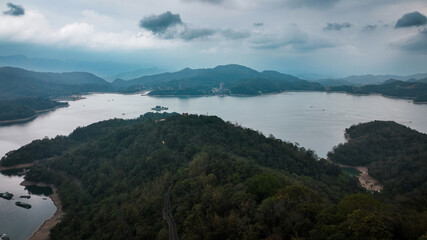Aerial view of Sun Moon Lake in Taiwan showing tranquil waters surrounded by lush mountains