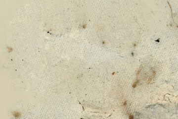 Handmade paper from waste paper with a sieve. One can clearly see the imprint of the sieve