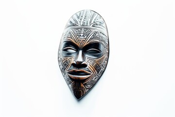 A decorative wooden mask featuring intricate tribal patterns and designs.