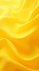 Abstract background made of translucent yellow silk fabric
