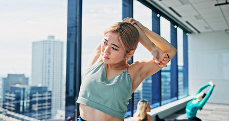 Fitness, Japanese woman and arms stretching in dance studio for practice, training and choreography in ballet. Warm up, muscle flexibility and dancer for company, theater and performance art school
