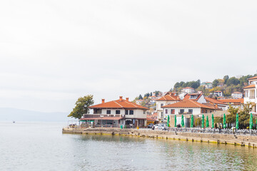 Obraz premium Picturesque view of Ohrid, a historic town nestled on the shores of Lake Ohrid. Charming architecture, and stunning lake views ,popular tourist destination. North Macedonia