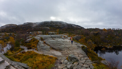 Hiking on a Rocky Trail in Overcast Mountains