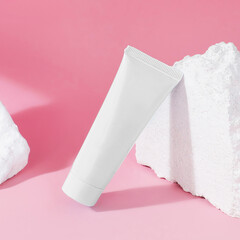 Cosmetic Tube, Tube mockup with white stone isolated on pastel pink background.