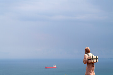 statue on the seaside cliff