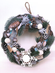 Christmas Wreath of pine branches, cones, leaves, beads and snowflakes. Holiday Decoration Gift For family and friends. New Year's home wall decor different angles handmade top view, side view