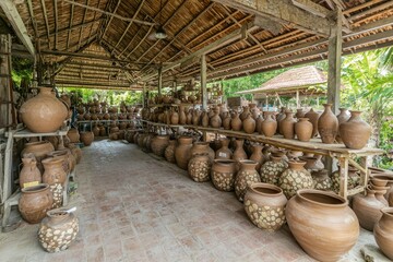 Earthenware pottery displayed in a rustic shop