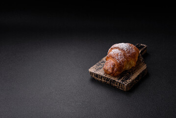 Fresh crispy sweet croissant with chocolate filling