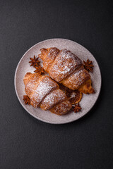Fresh crispy sweet croissant with chocolate filling