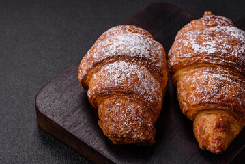 Fresh crispy sweet croissant with chocolate filling