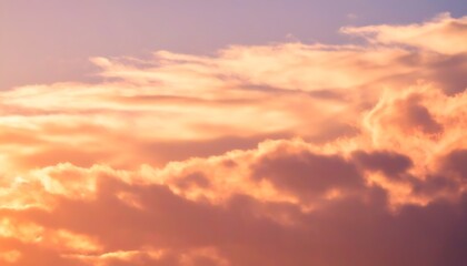 Obraz premium Artistic dreamy orange clouds in a serene sky