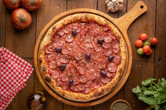 pizzas , queijos, cebola, assada, mussarela, azeitonas, brocolis,requeijao,frango,ovo,marguerita,milho e ervilhas