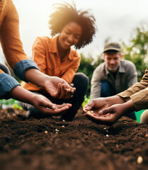 Growing Together, Community Gardens for Health and team building, city agriculture, seeds planted in fresh plow ground, people planting vegetables seeds