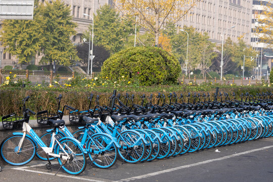 Row of shared bicycles park on the road side in Beijing, China