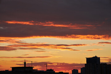 Fiery Sunset Sky Over City Silhouettes