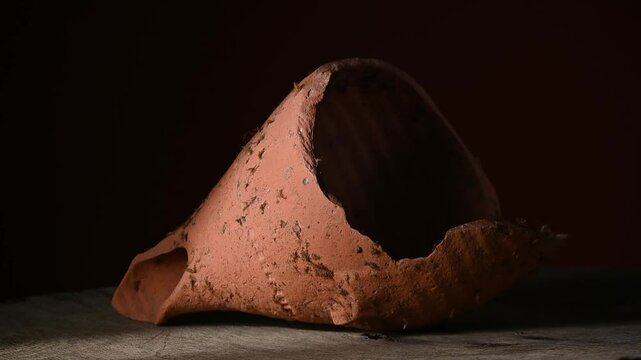 Old broken terracotta vase, handmade antique object
