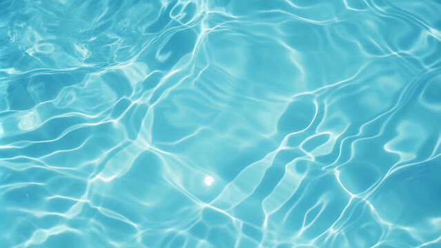 Textured blue water surface in a swimming pool, featuring ripples, splashes, and a shimmering pattern of bubbles.
