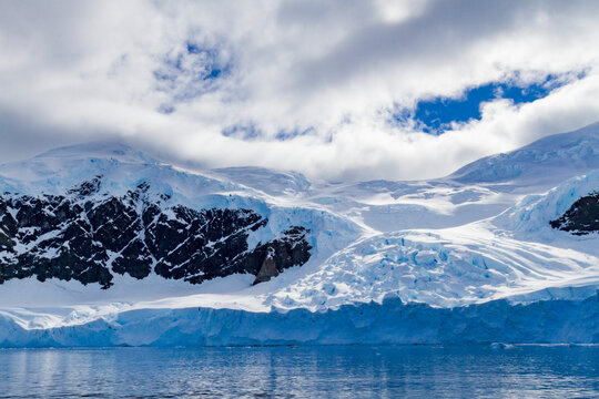 View of snow-capped mountains in Neko Harbor in Andvord Bay, Antarctica