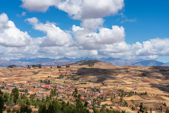 Racchi village near Chinchero with distant views of Andes mountains, Sacred Valley, Peru