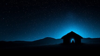 Silhouette of a humble stable under a starry night sky.