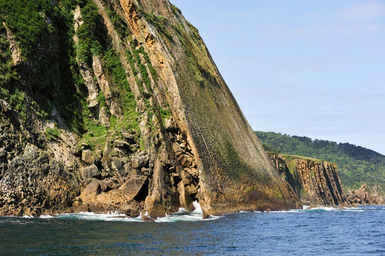 Cliffs along the channel mouth of Pasaia, San Sebastian, Bay of Biscay, province of Gipuzkoa, Basque Country, Spain
