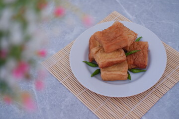 Tahu Bakso, Indonesian traditional snack made from tofu and beef. Served in white plate.