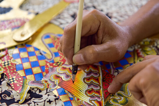 Workshop of puppets for shadow play (wayang kulit), Bima Art Shadow Puppet Maker, Sondakan district, Solo (Surakarta), Java island, Indonesia, Southeast Asia
