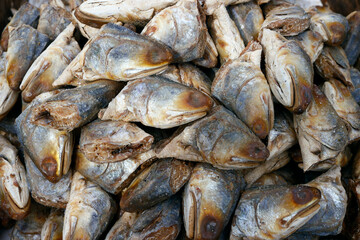 Heads of dry fish for sale at local market, An Giang Province, Mekong Delta, Vietnam, Indochina, Southeast Asia