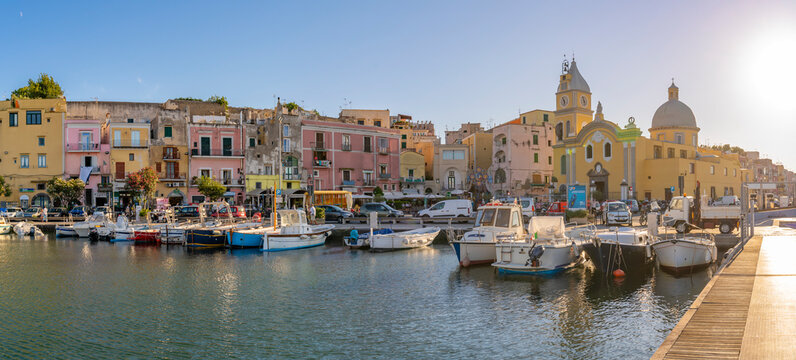 View of Church of Santa Maria della Pieta in the fishing port Marina Grande with boats at golden hour, Procida, Phlegraean Islands, Gulf of Naples, Campania, Southern Italy, Italy
