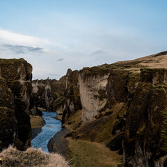 Picturesque Fjadrargljufur Canyon in South-Iceland. Beautiful nature. Mountain river between rocks.
