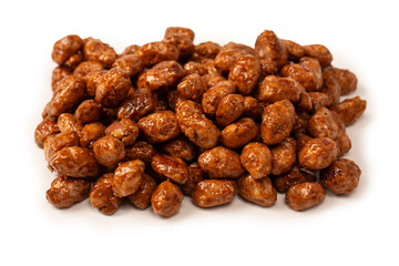 Tasty sweet roasted peanuts isolated on a white background.