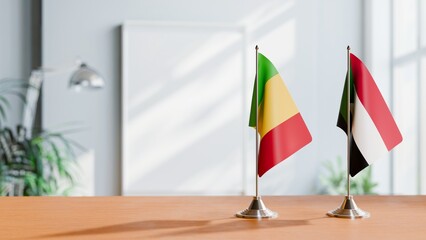 FLAGS OF MALI AND SUDAN ON TABLE