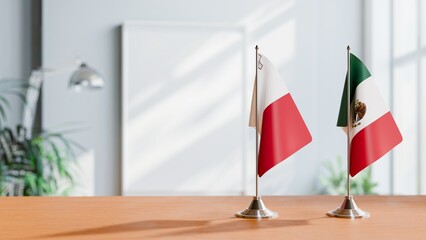 FLAGS OF MALTA AND MEXICO ON TABLE