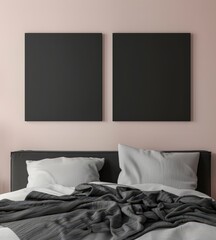 Two blank black canvases hanging above a bed with white and grey bedding in a pink room