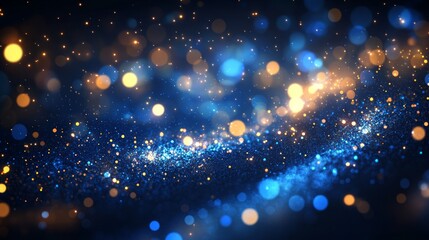 Obraz premium Abstract bokeh background with glittering blue and gold particles.