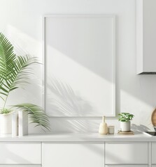 Minimalist white kitchen countertop with framed artwork. potted plants. and sunlight