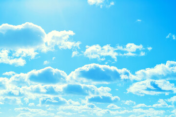 Obraz premium Blue sky nature, colorful blue sky landscape with floating fluffy clouds