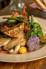 Grilled chicken with oven-baked vegetables ready to eat