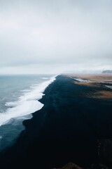 Aerial view of Reynisfjara black sand beach in Iceland.