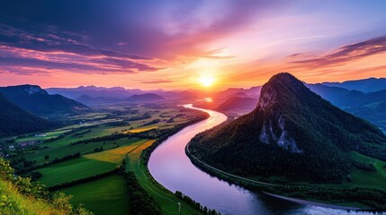 Fototapeta premium Majestic Sunset Landscape with Winding River and Towering Mountains