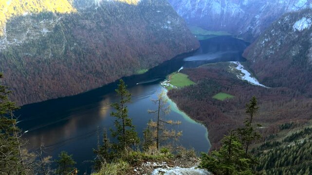 St. Bartholoma on Konigssee in Bavaria, Germany, is breathtaking landmark surrounded by Bavarian Alps aerial view of mountain viewpoint. Luftaufnahme St. Bartholoma Wallfahrtskirche Berchtesgadener. 