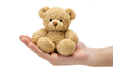 Obraz premium A hand gently cradles a soft, plush teddy bear. This adorable toy has round ears and a friendly expression, showcasing its cozy texture. The neutral background highlights the bears warm color and char