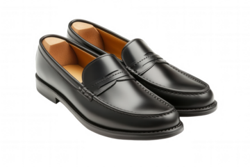 These black leather loafers feature a classic design suitable for both formal and casual wear. Their sleek silhouette and high quality material provide comfort and style, ideal for any setting.