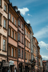 an intersection with a couple bikes and a man in red