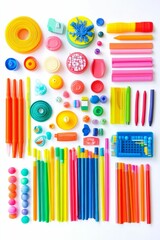 Obraz premium Colorful stationery and small objects arranged neatly.