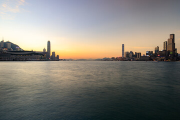 Serene Twilight Over Victoria Harbour with Hong Kong Skyline
