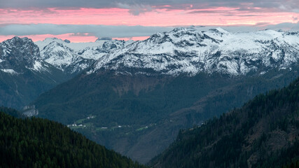 Fiery Red Skies Over the Majestic Dolomite Mountains: A Sunset Spectacle
