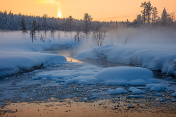 Fog at Sunset over Snowy Forest and River