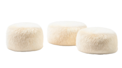 Cozy round pouf ottoman with fluffy fur and soft cushion, perfect for elegant and modern living room decor and comfortable seating