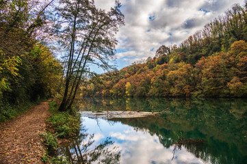 adda river during the autumnal season, lecco